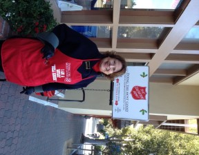 Susan Clark ringing the bell for the Salvation Army in Carmel-by-the-Sea at the Post Office.