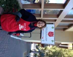 Susan Clark ringing the bell for the Salvation Army in Carmel-by-the-Sea at the  Post Office.