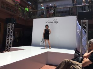 Model on the runway in Carmel Plaza.