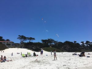 Carmel Beach - kite flying is a fun activity at the beach!